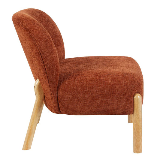 Rust upholstered chair with wooden legs on a white background