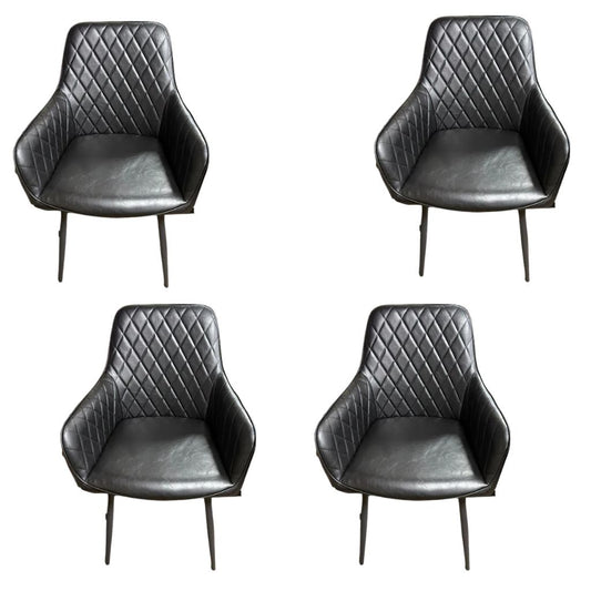Four black quilted chairs on a white background