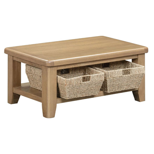 Wooden coffee table with three woven baskets on a white background