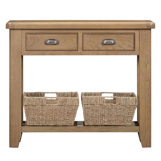 Wooden console table with two drawers and two wicker baskets on a white background