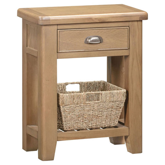 Wooden side table with a drawer and wicker basket on a white background