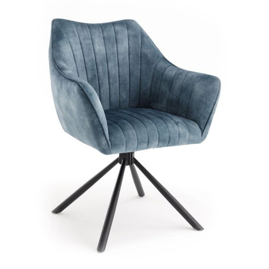 Blue velvet armchair with black metal legs on a white background