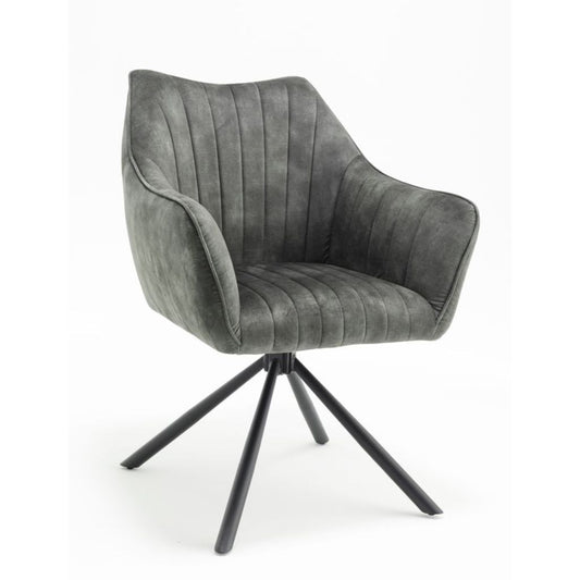 Green upholstered dining chair with black metal base on a white background
