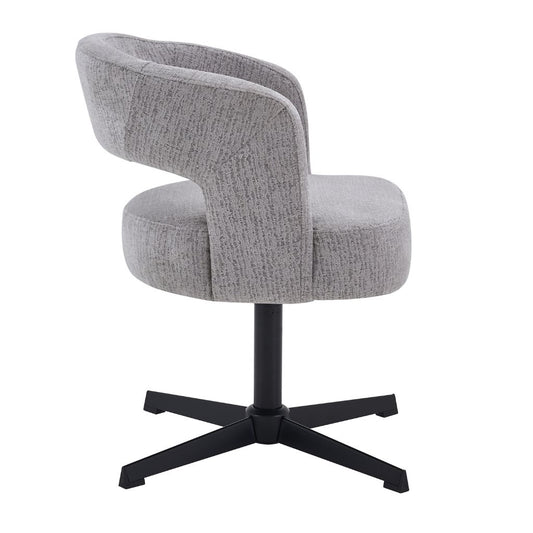 A modern and contemporary dining chair in grey textured fabric and black legs