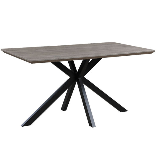 Dining table with wooden top and black metal legs on a white background