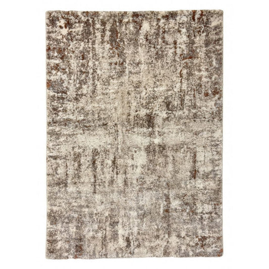 Cream patterned area rug