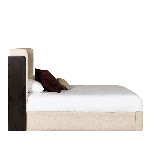 Bed with white mattress, brown pillow, and beige frame on a white background