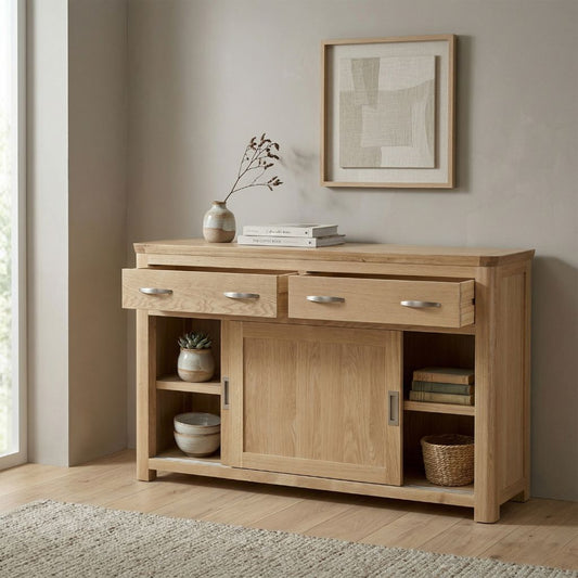 A beautiful oak side board featuring two drawers as well as two sliding doors giving it that contemporary feel.