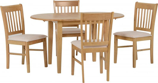 Wooden dining table with four matching chairs