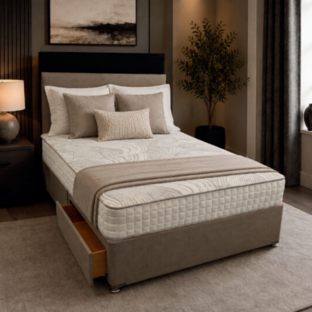 A bed with a 1000-pocket white mattress, 2 drawer base and a headboard on legs. 