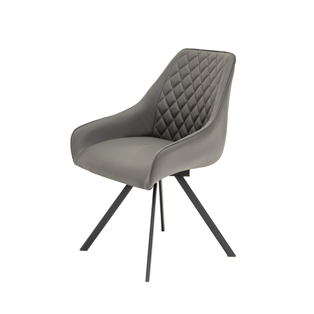 A modern grey upholstered dining chair with a diamond-quilted backrest and swivel base.