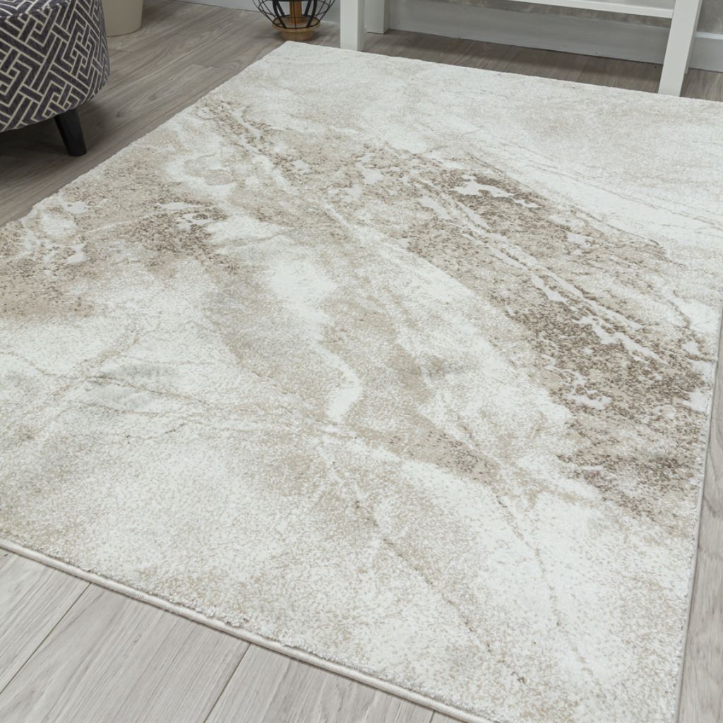 Textured area rug on a wooden floor