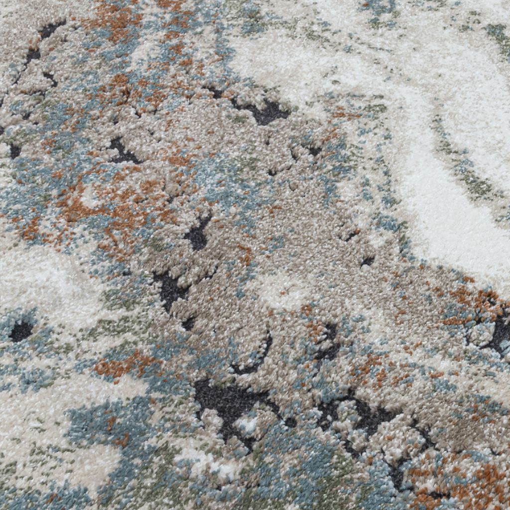 Close-up of a textured rug with multicolor pattern