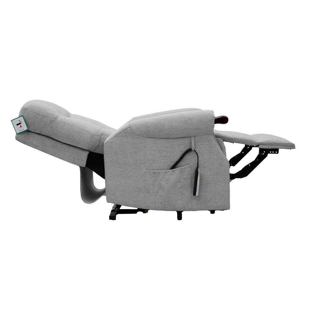 Gray recliner chair with armrest and footrest on a white background