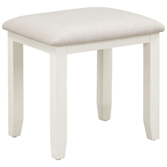 Ivory stool with a light oat cushion on a white background