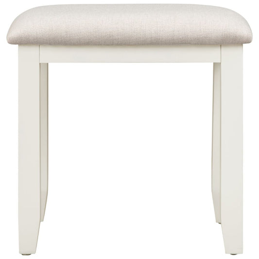 Ivory stool with a beige cushioned top on a white background