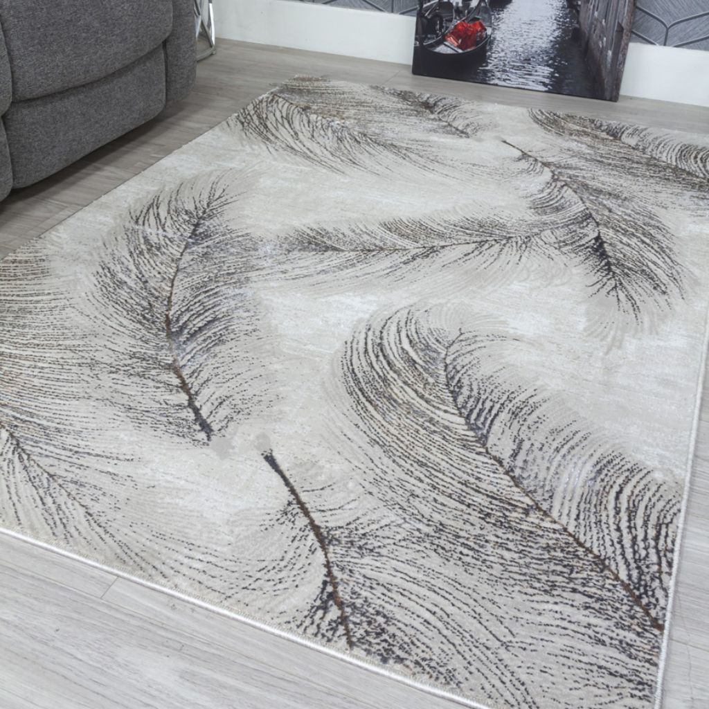 Gray area rug with abstract pattern on a wooden floor