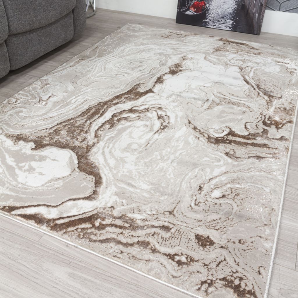 Marble-patterned rug on a wooden floor with a gray sofa in the background