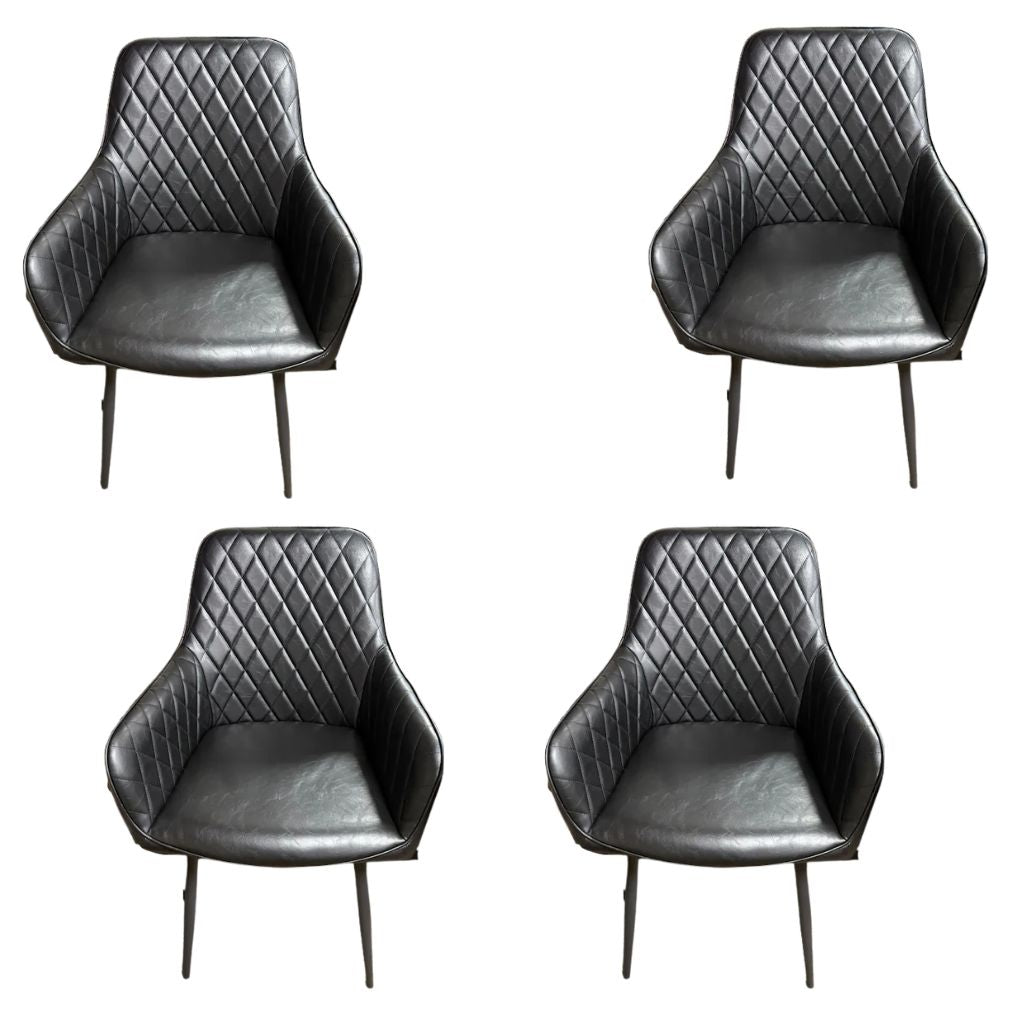 Four black quilted chairs on a white background