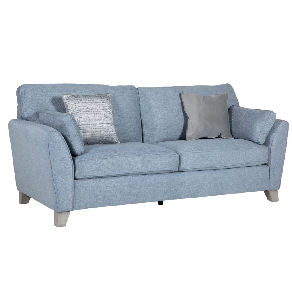 Blue sofa with gray cushions on a white background