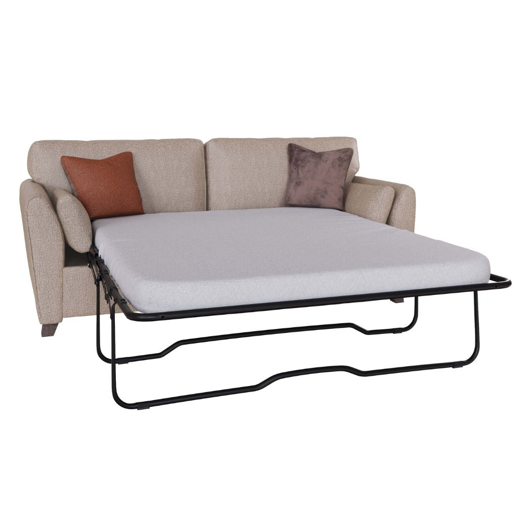 A beige upholstered sofa which pulls out into the perfect sofa bed for guests.