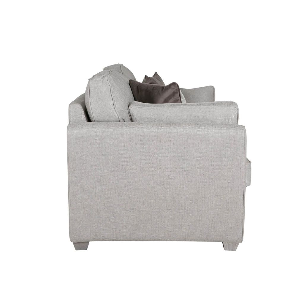 Side view of the gorgeous light grey sofa bed with clean wooden legs.