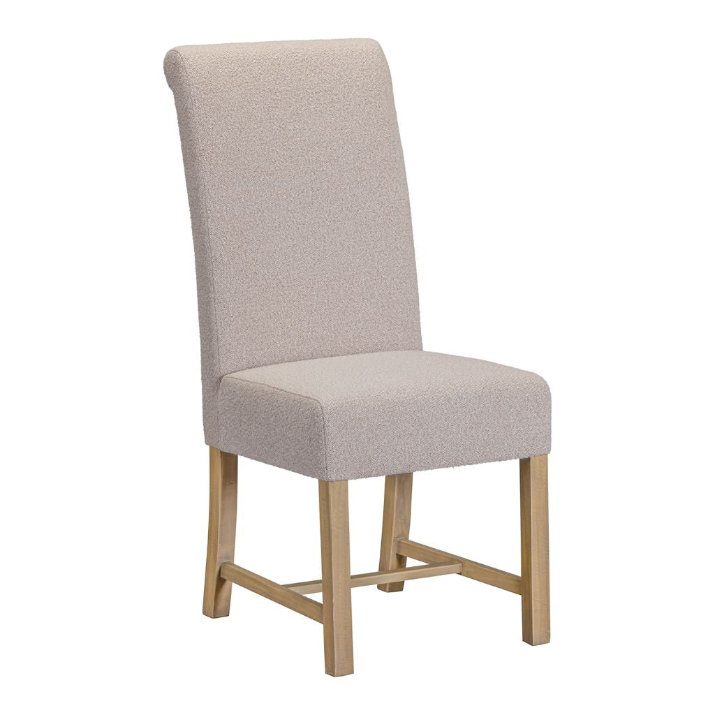 Beige upholstered chair with wooden legs on a white background