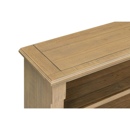 Wooden bookshelf edge with a white background