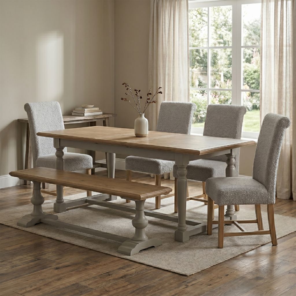 Dining room with wooden table, chairs, and bench in a well-lit room.