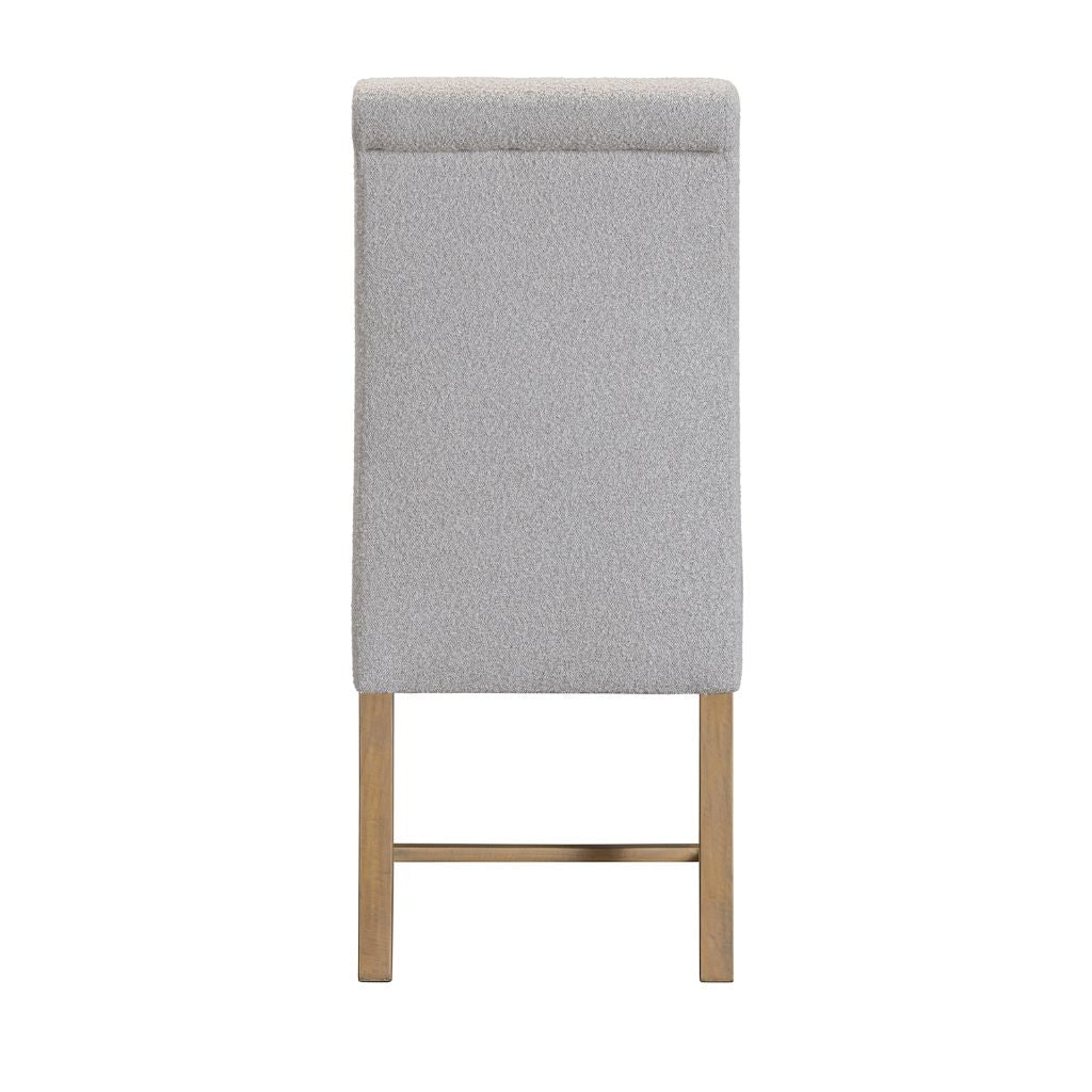 back view of a grey dining chair in a textured fabric and pine legs 