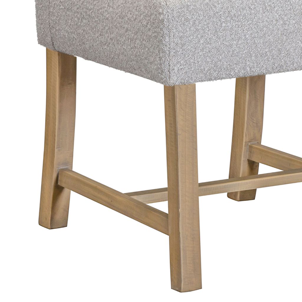 the warmth of the pine legs offer a beautiful contrast to the grey fabric