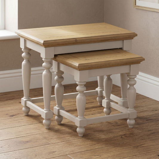 set of two nesting tables in a pine and grey painted finish