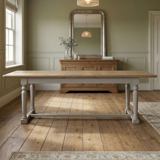 Grey painted pine dining table that extends from 2m to 2.5m.