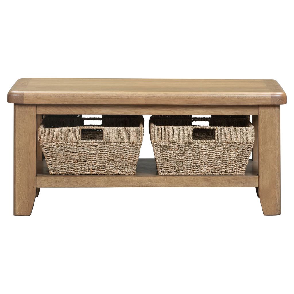 Wooden coffee table with two woven basket storage compartments on a white background
