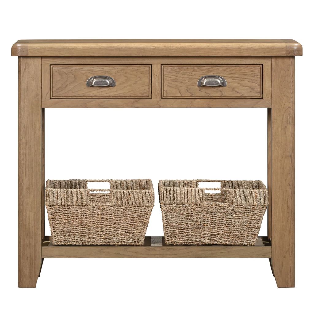Wooden console table with two drawers and two wicker baskets on a white background
