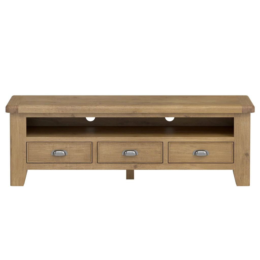 Wooden TV stand with three drawers on a white background