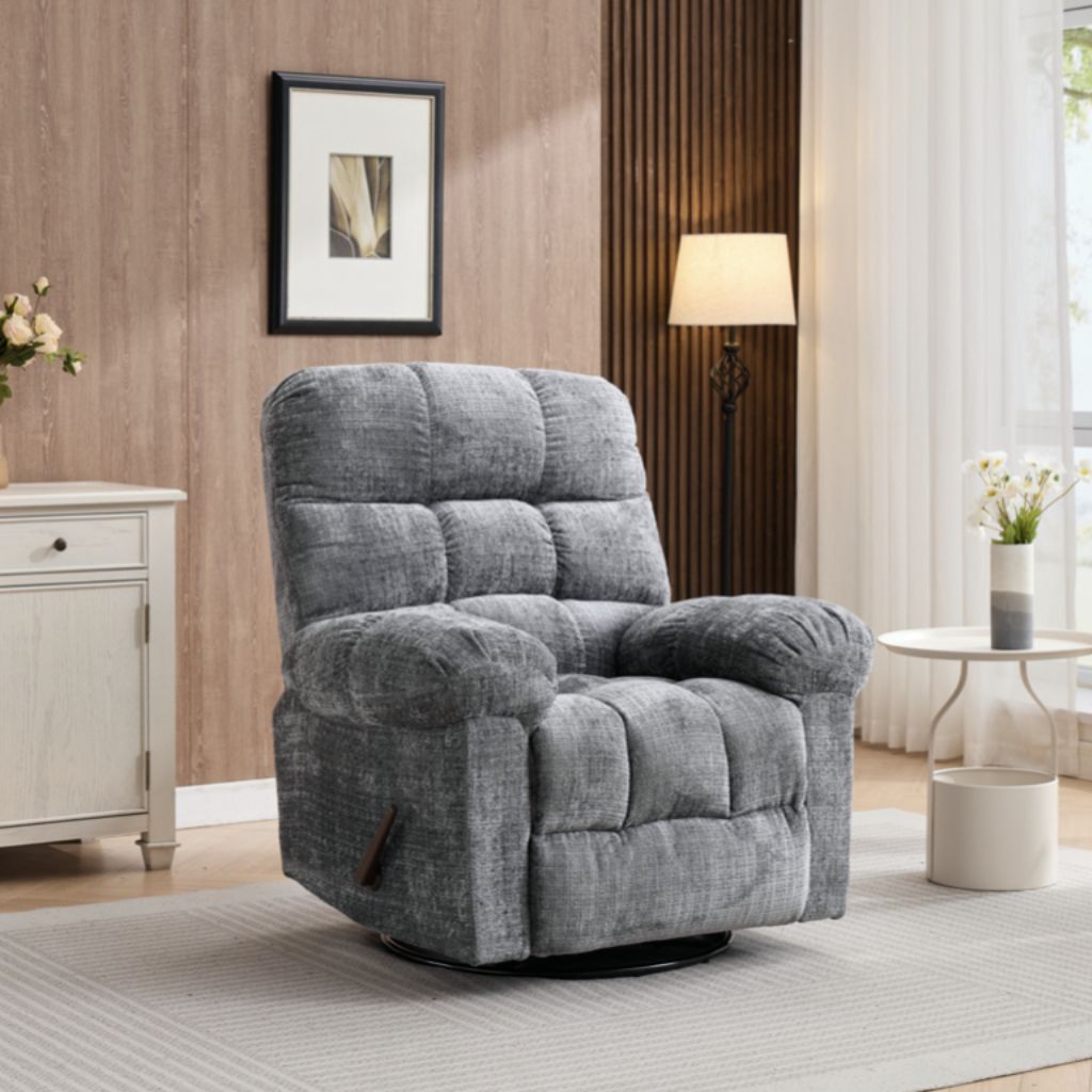 Gray recliner chair in a living room setting with a lamp and cabinet.
