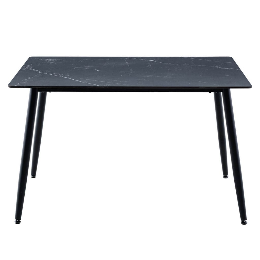 A modern rectangular dining table with a black sintered stone top and four tapered black metal legs.