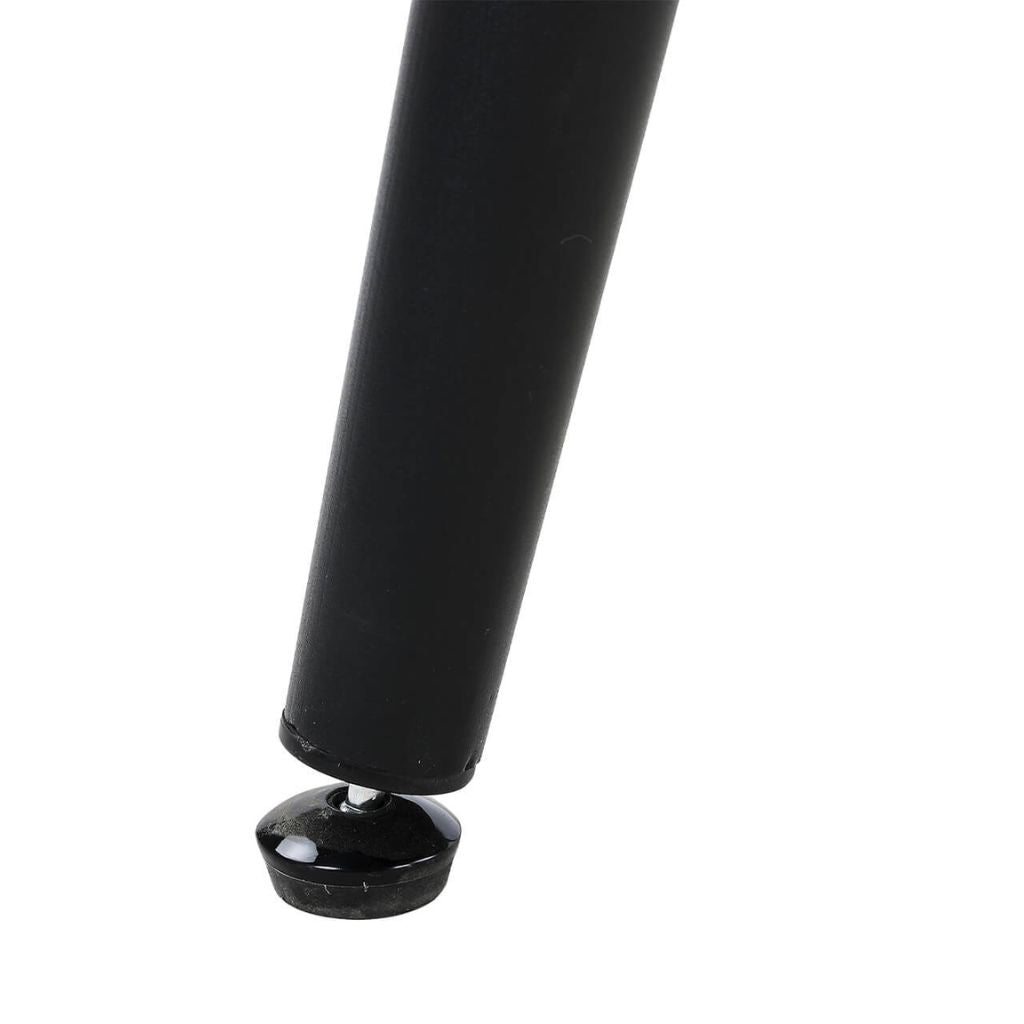 Close-up of the black table leg 