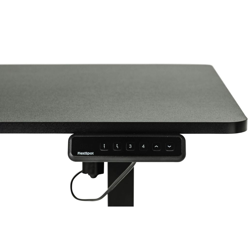 Black adjustable desk with control panel on a white background