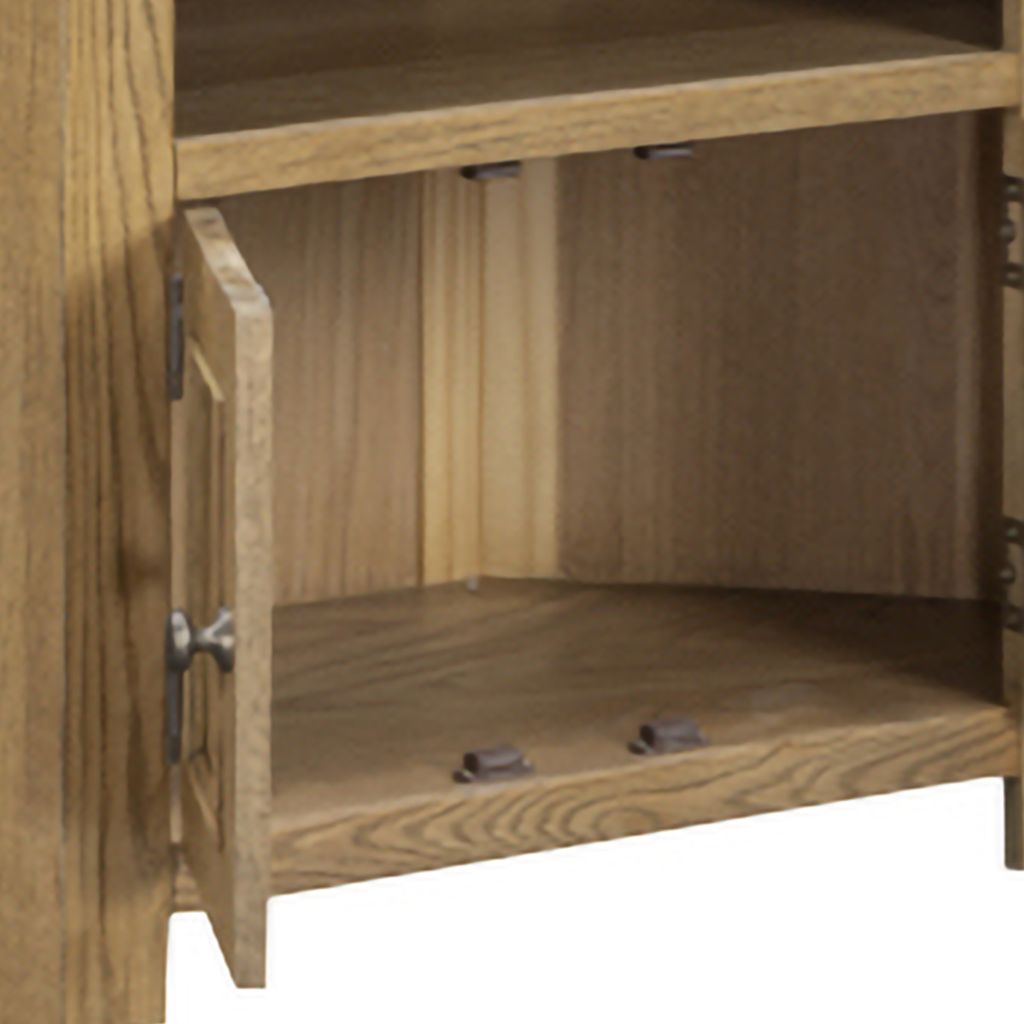 Close-up of a wooden cabinet with one door open, showing the interior shelves