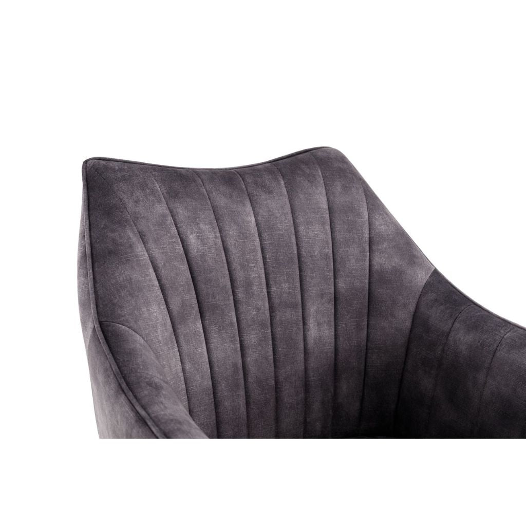 Grey cushion with pleated design on a white background