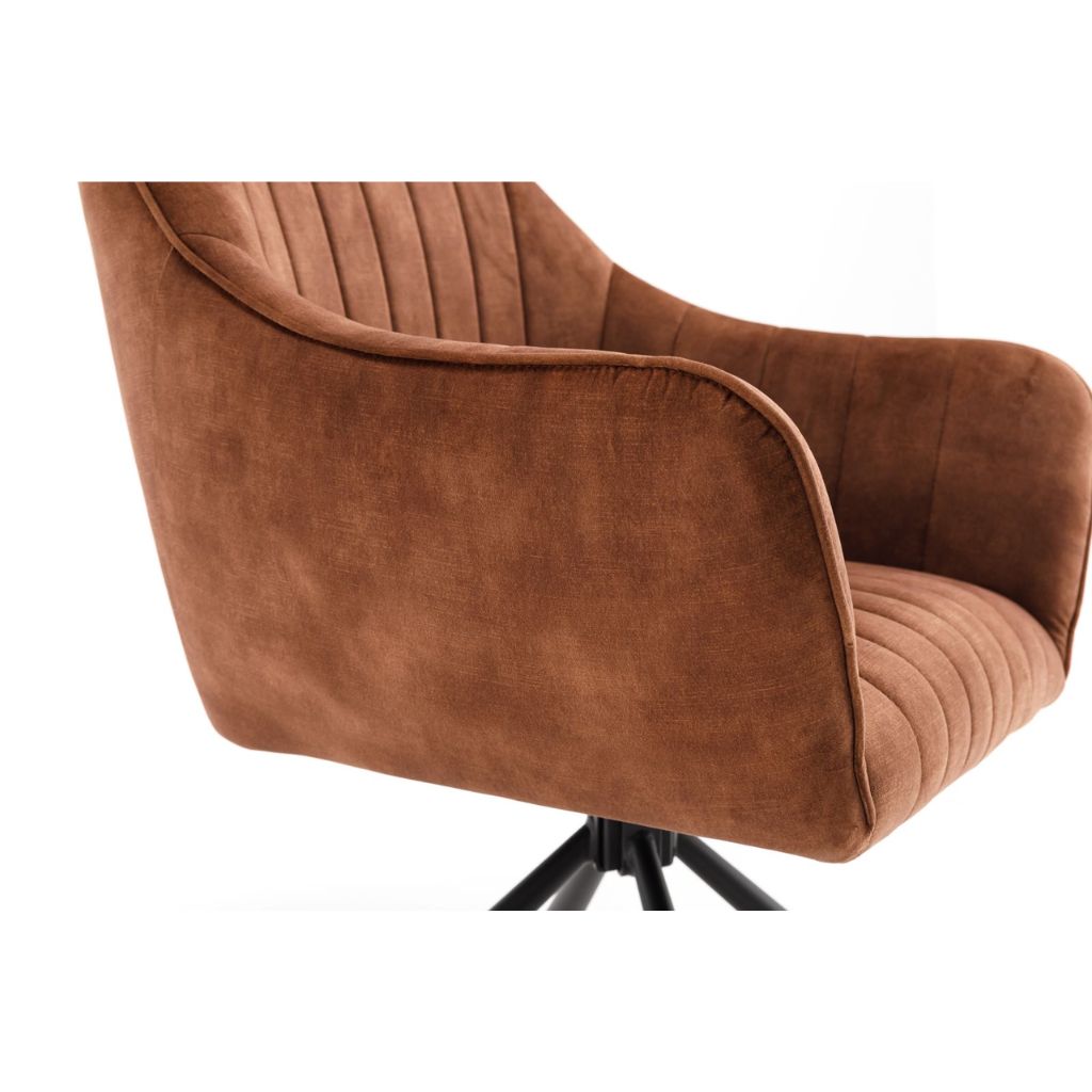 Rust upholstered chair on a white background