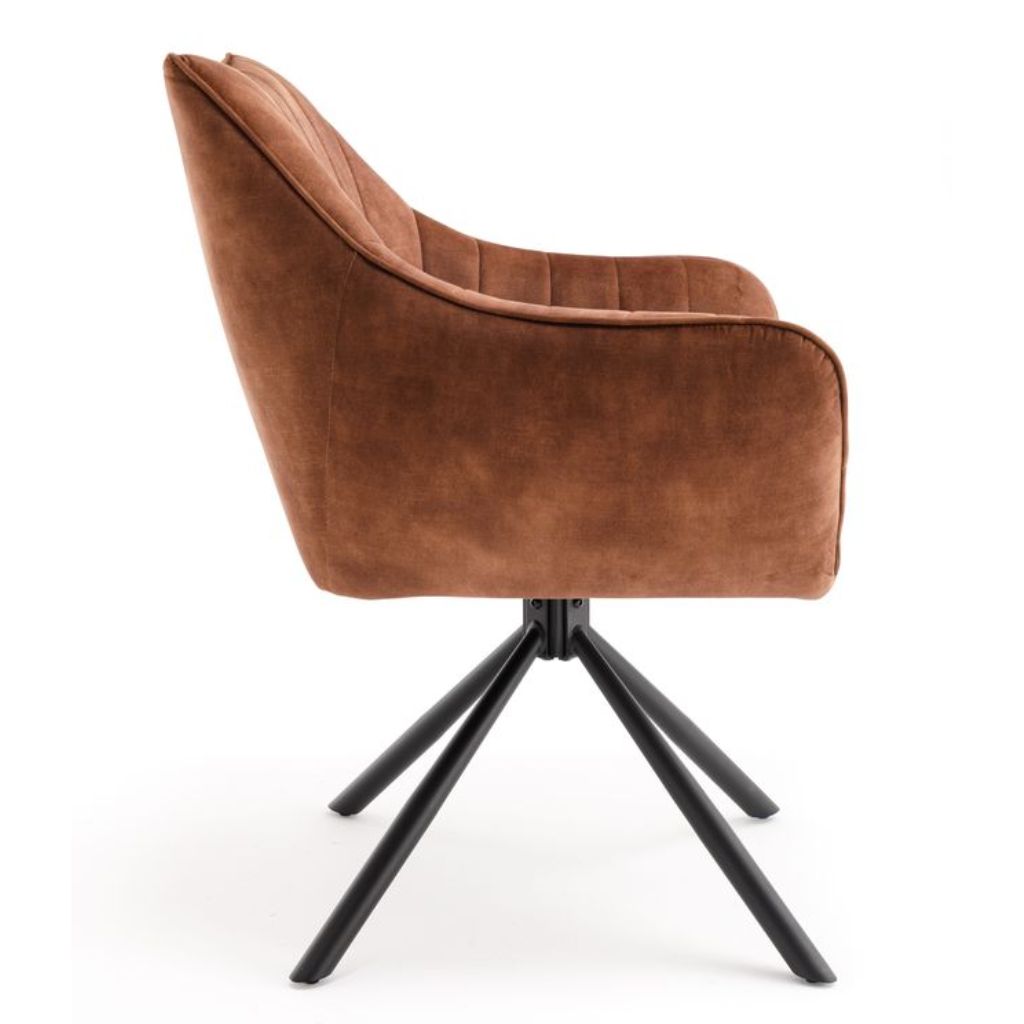 Rust upholstered chair with black metal base on a white background