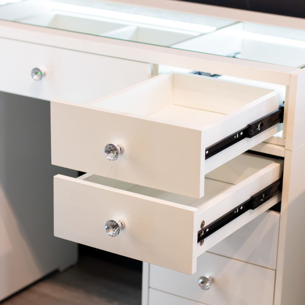 Drawers feature gorgeous crystal style handles to add that extra glamour.