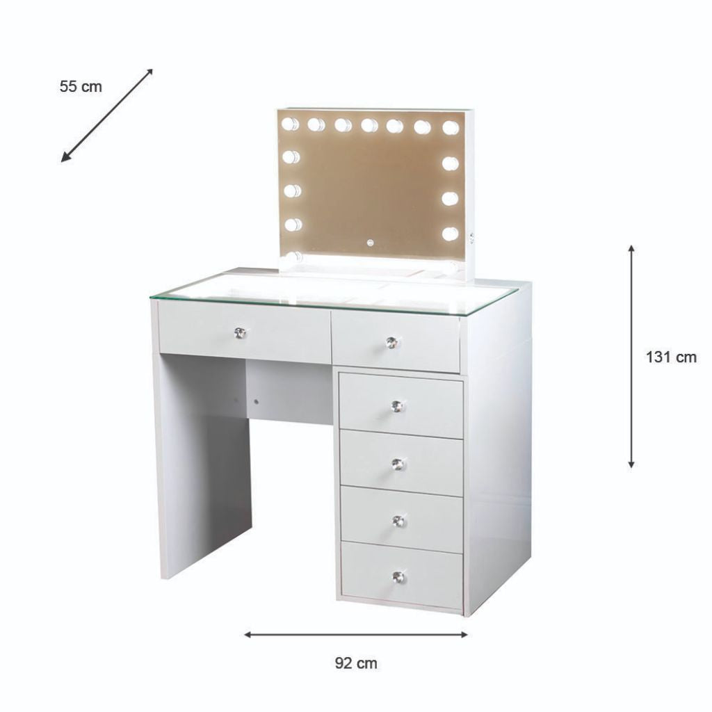 Dimensions of white vanity table with an illuminated hollywood mirror and six drawers, and a glass top.