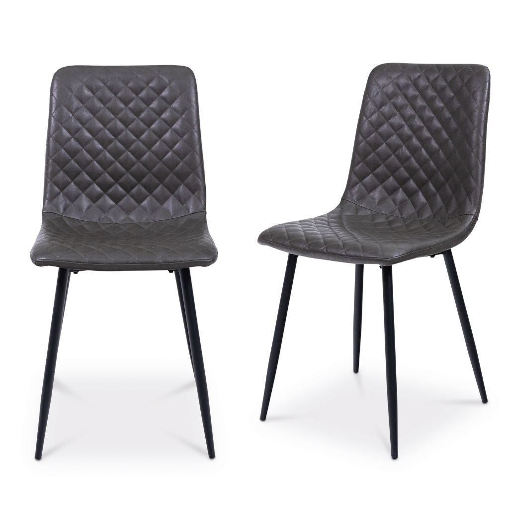 Two grey quilted chairs with black legs on a white background
