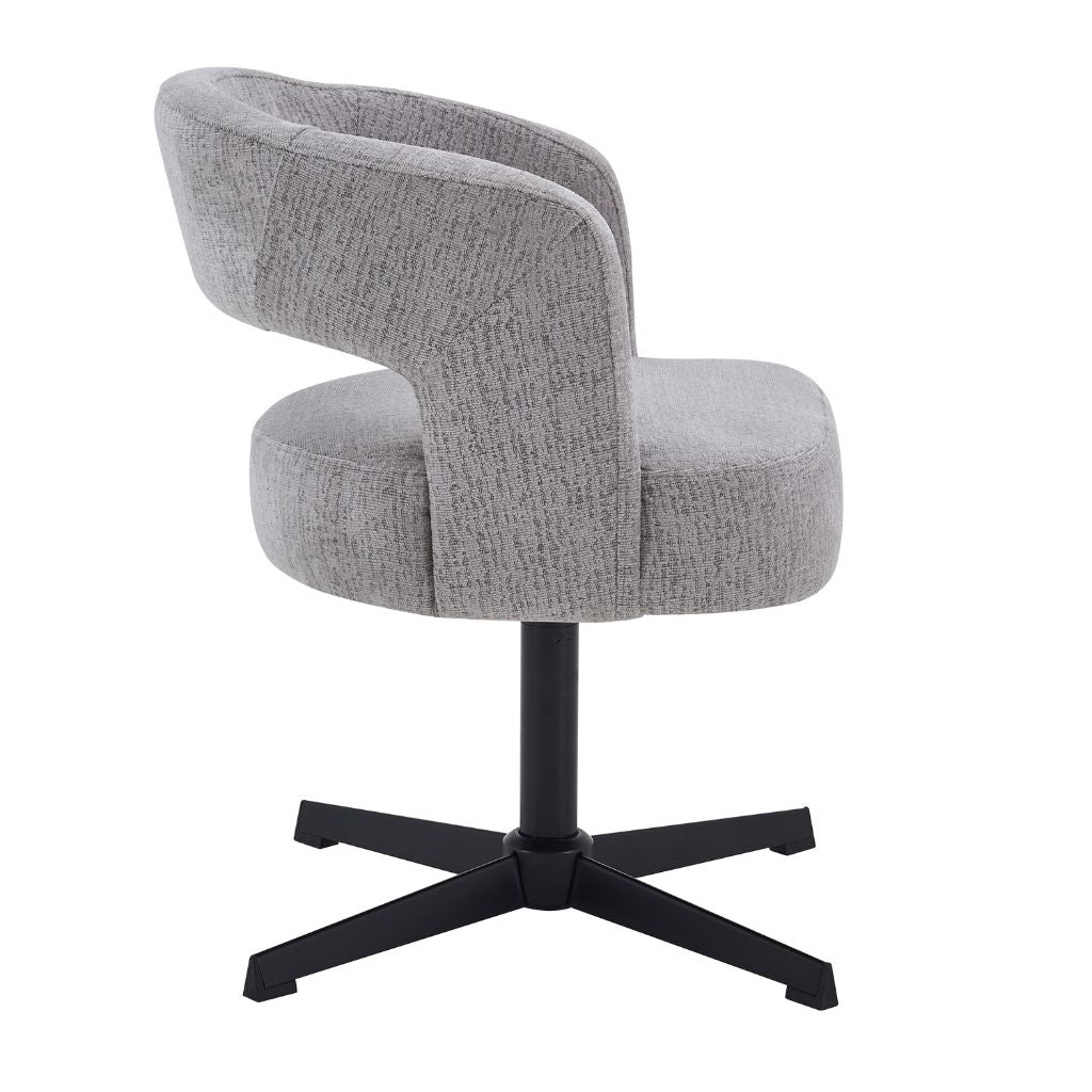 A modern and contemporary dining chair in grey textured fabric and black legs