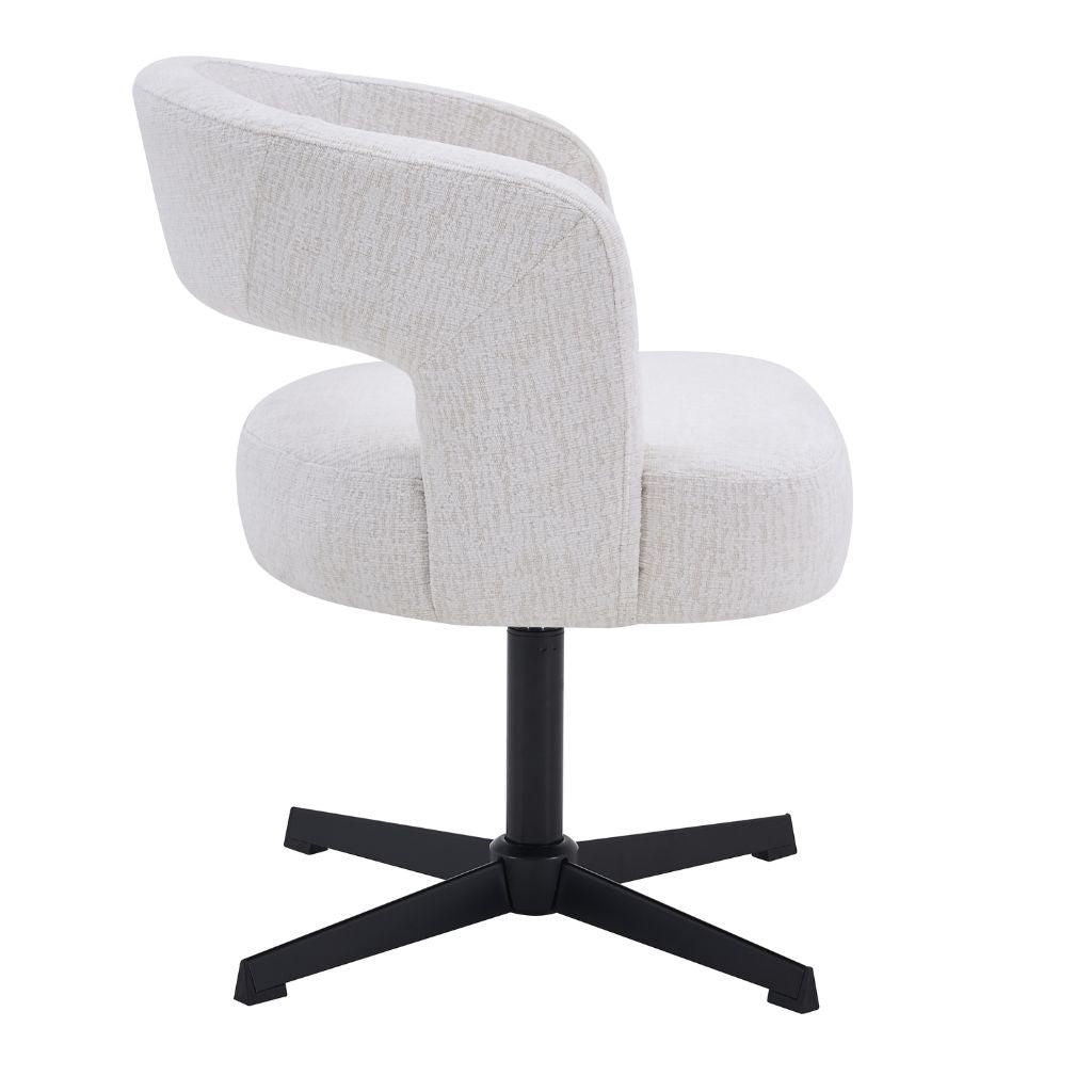 A modern dining chair with a curved, high-back upholstered seat in a textured ivory fabric, supported by a black metal four-star base.
