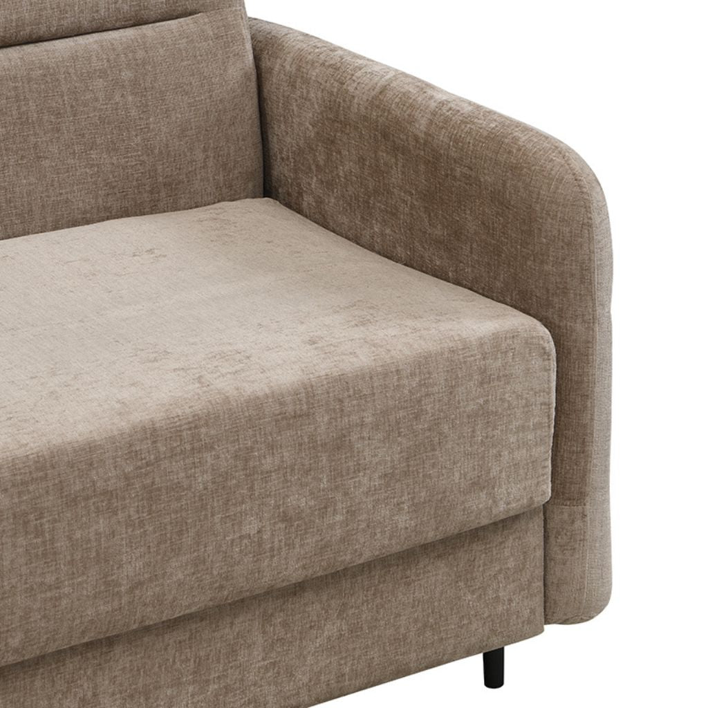 Close-up of a beige fabric sofa on a white background